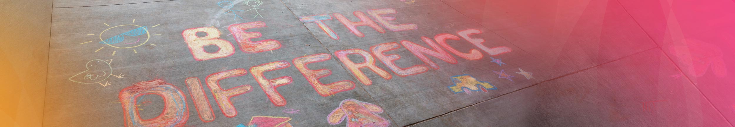 sidewalk chalk art reads 'be the difference'