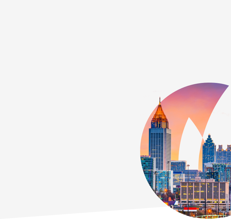 Atlanta city skyline against Gas South logo flame