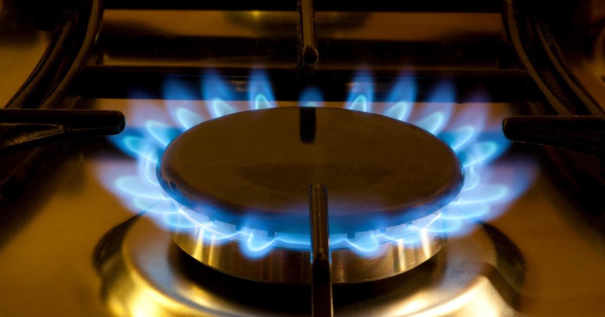 Natural gas stove burner with blue flame